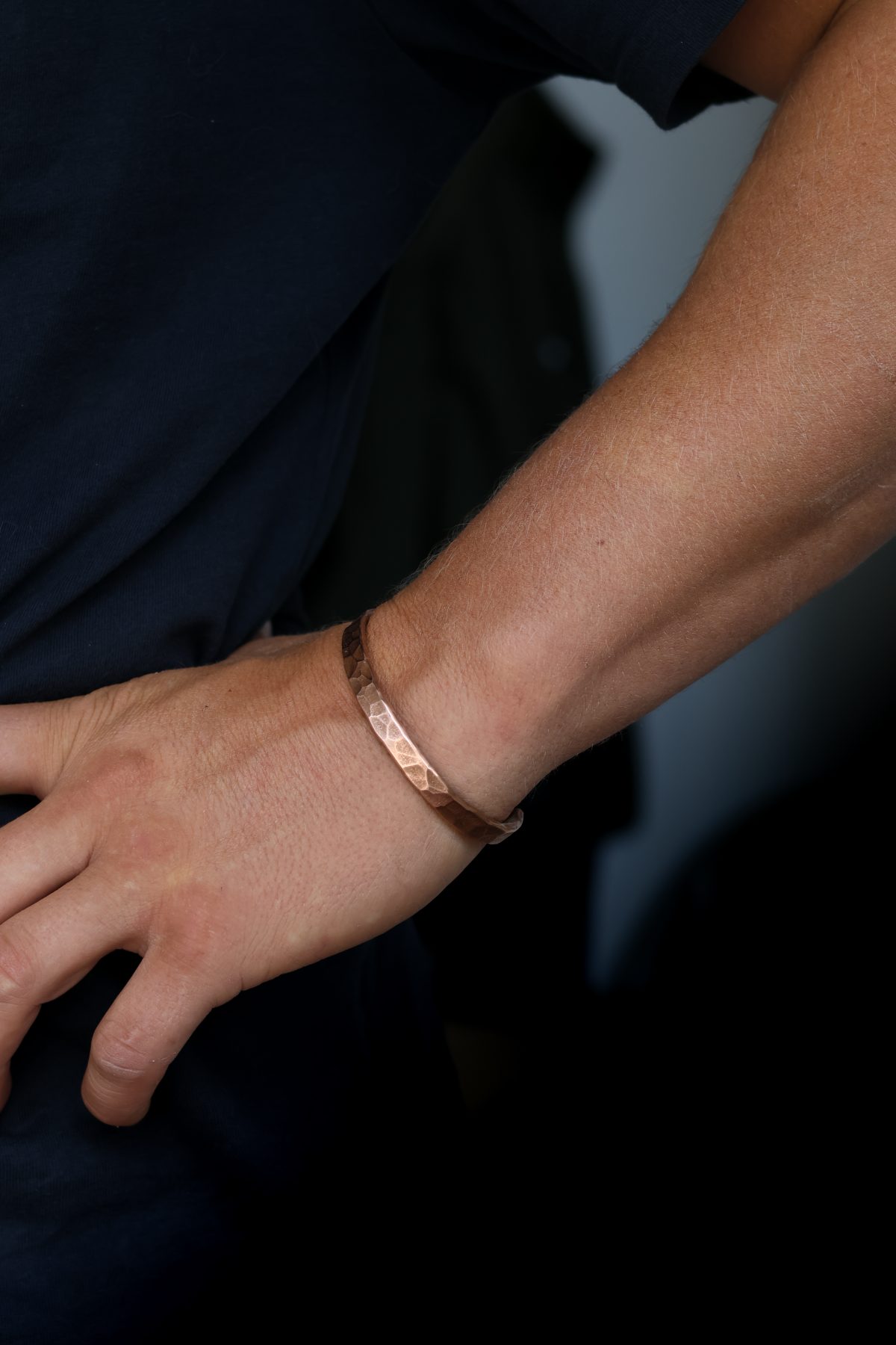 Cooper Bangle, Cooper Hammered Bangle, worn by goldsmith James French in Devon, UK. Get your handmade copper bangle here
