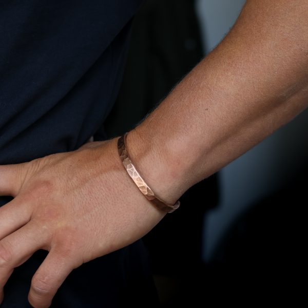 Cooper Bangle, Cooper Hammered Bangle, worn by goldsmith James French in Devon, UK. Get your handmade copper bangle here