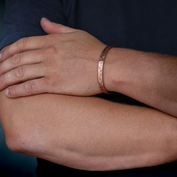 Copper Hammered Bangled, an earthy cooper tone in a Matt finish, this copper bangle is handmade in Devon by goldsmith James french at JWF Unique Designs