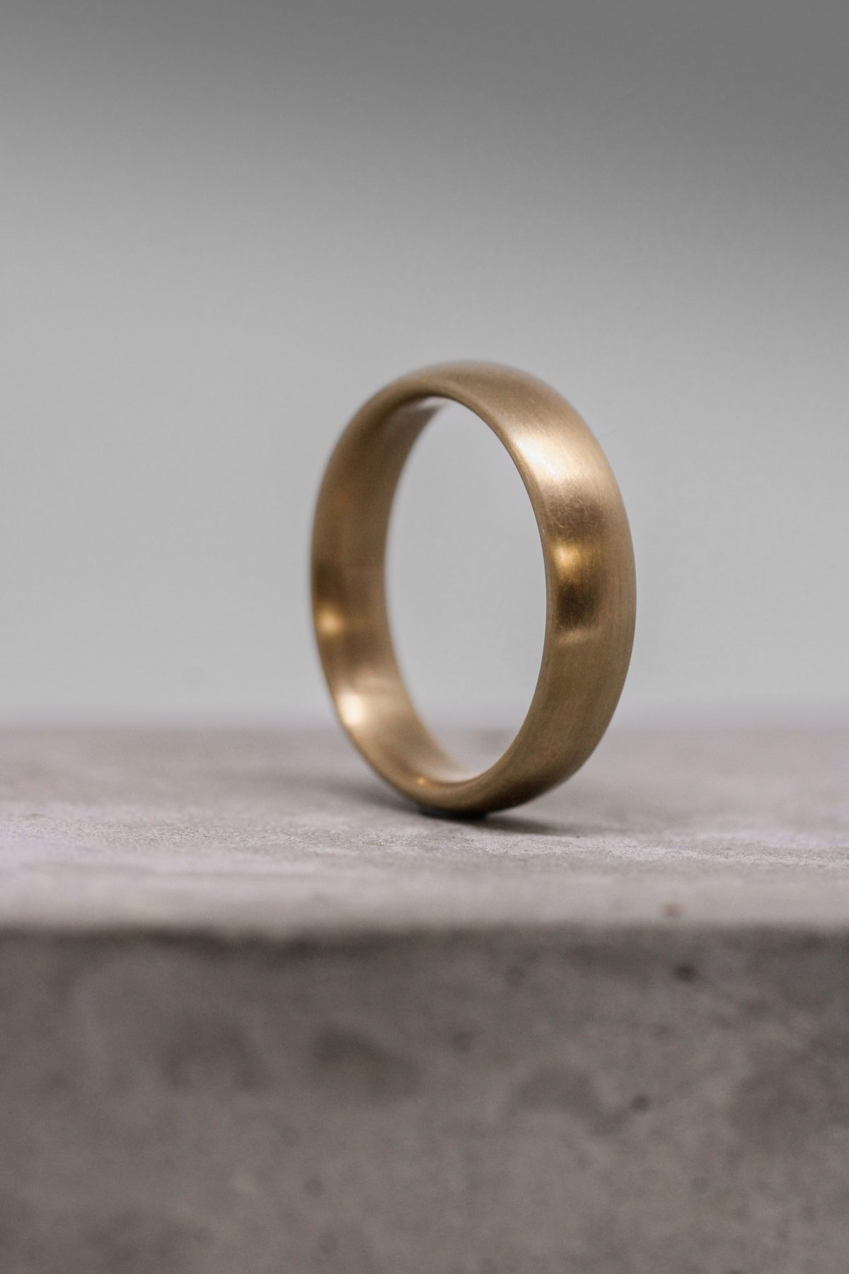 Bronze Ring, Bronze Court Ring, Alternative Wedding Rings, Alternative Rings, Metal Rings, Alternative metal rings, wedding rings, bronze wedding rings, bronze wedding bands, metal rings, gold rings, court wedding rings, unique wedding rings, bespoke wedding rings, bespoke bronze ring, court wedding bands, d shape wedding rings, Devon jeweller, goldsmith, wedding rings, wedding bands, bespoke wedding rings in the uk, steel rings, bronze, commission bronze rings