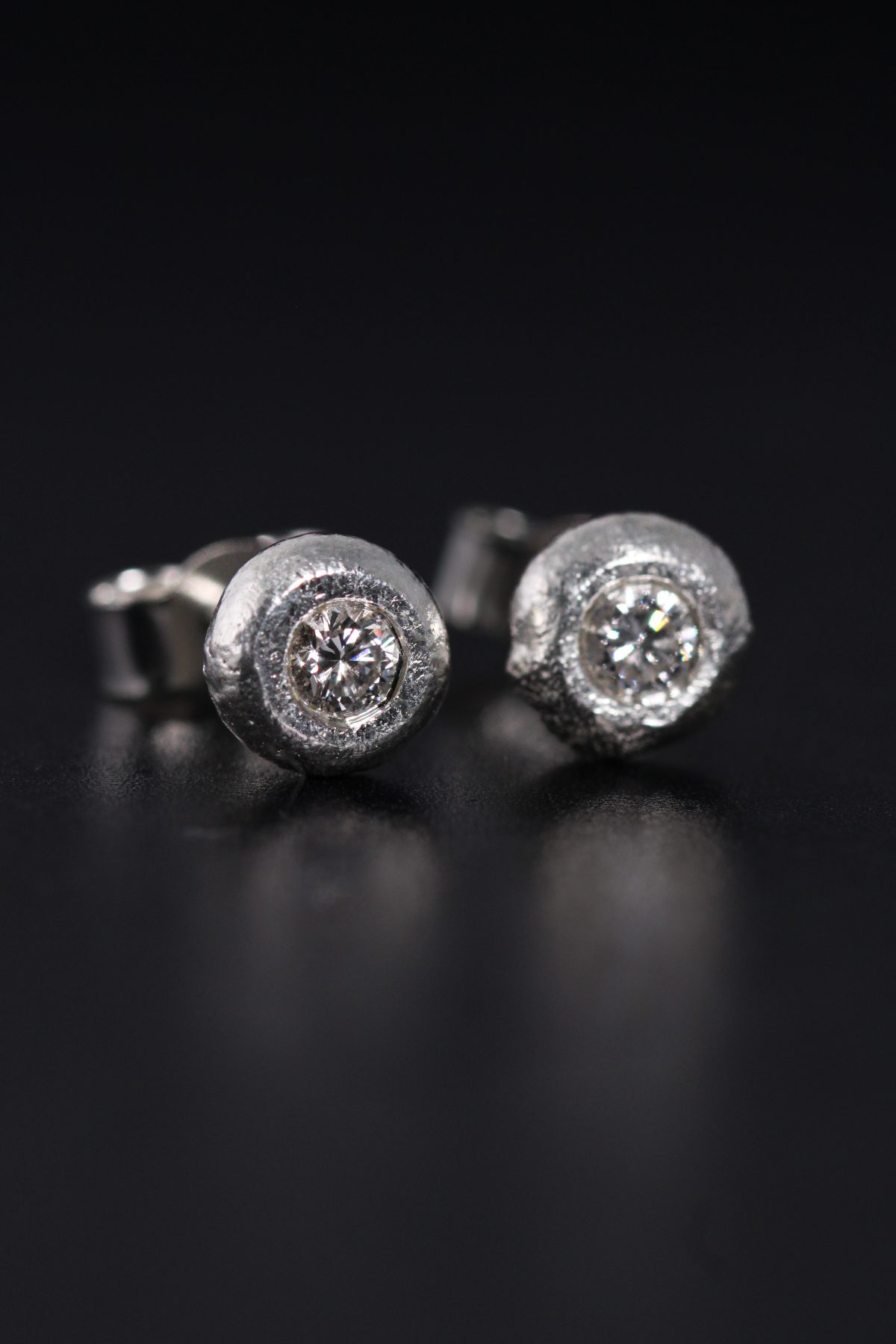 Diamond stud earrings, diamond earrings, sterling silver earrings, silver diamond earrings, silver diamond studs, sandcast jewellery, sandcast earrings, bespoke diamond earrings, bespoke diamond studs