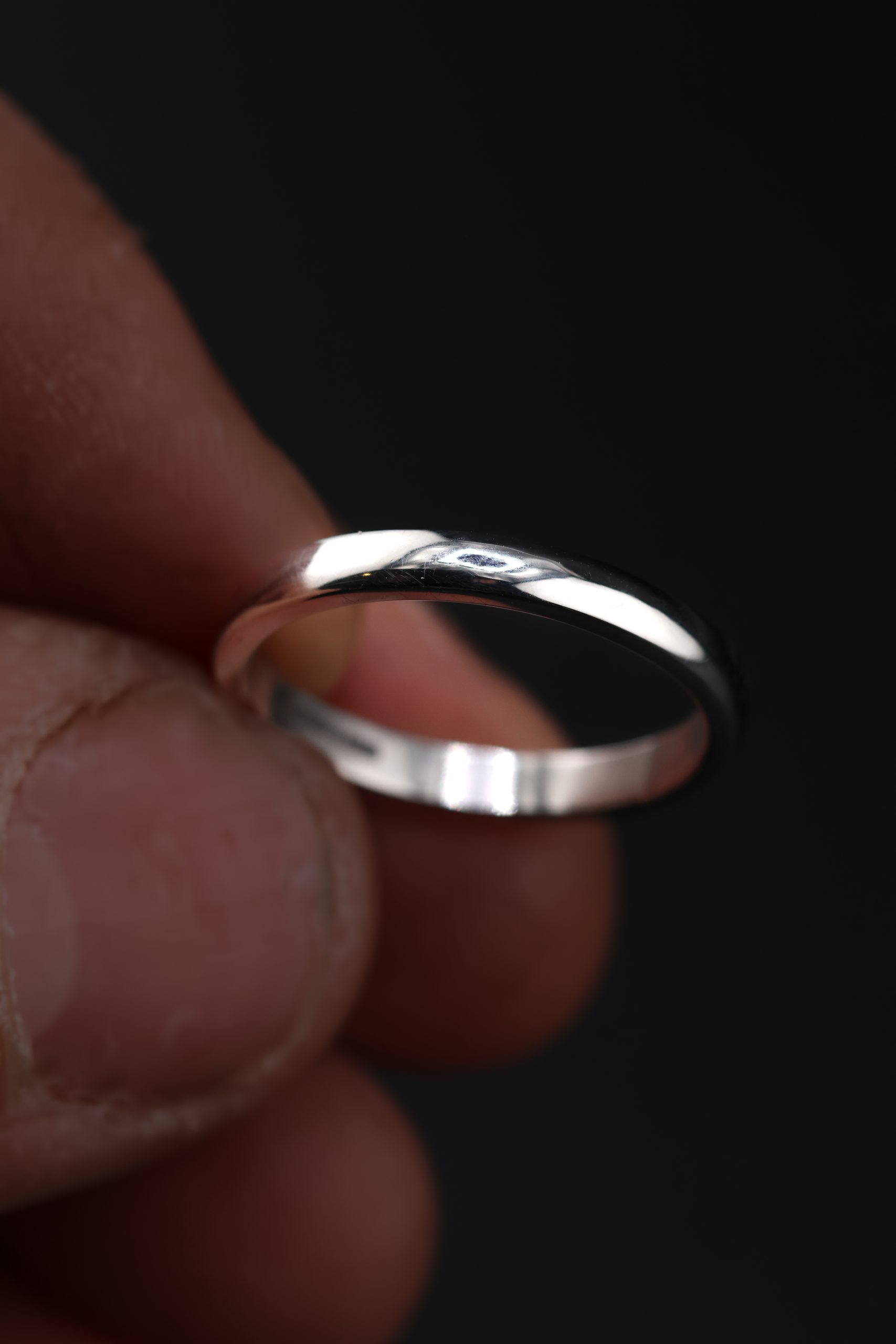 9E2A4355 Platinum polished wedding ring. Handmade in Devon by award winning goldsmith, JWF Unique Designs.