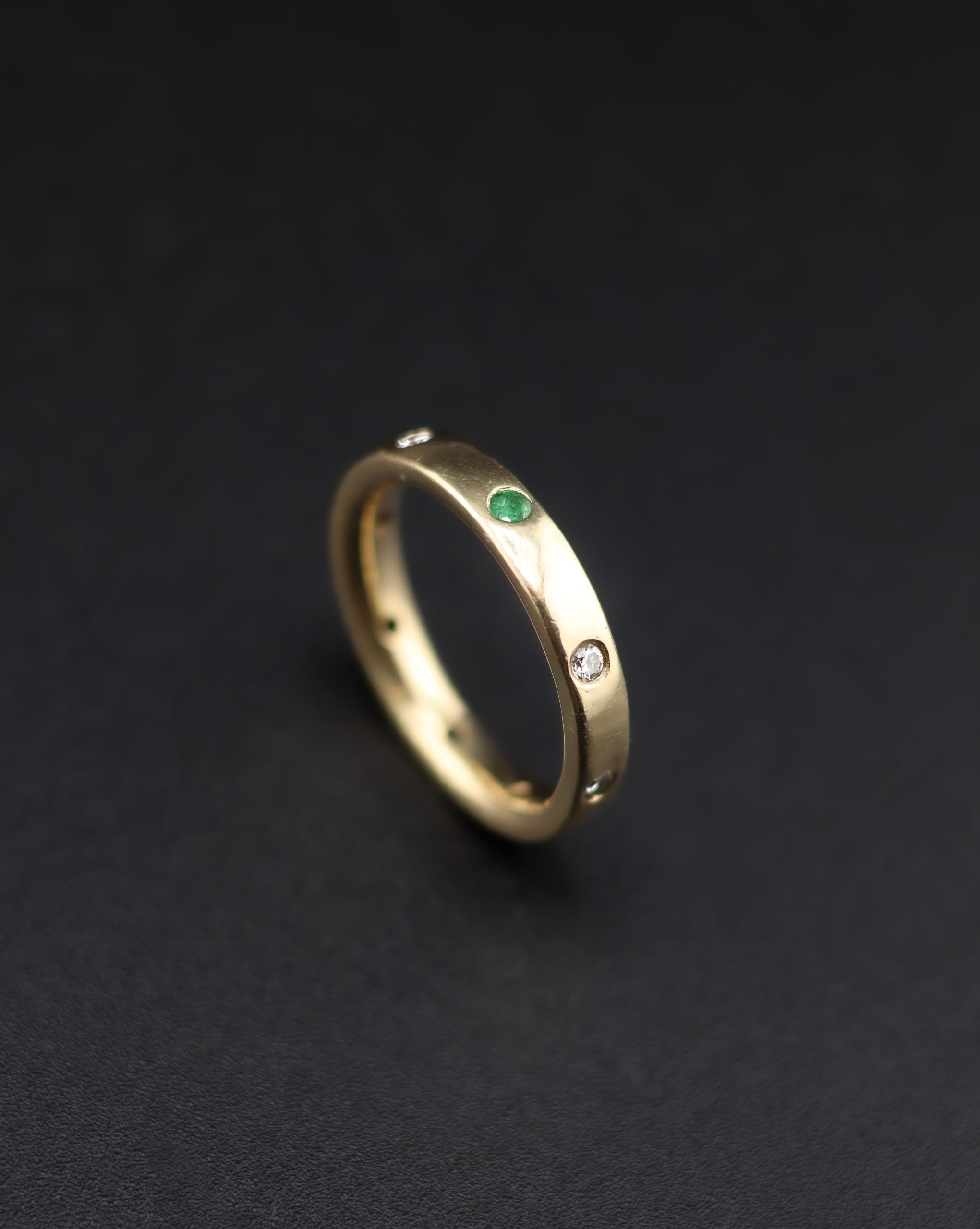 9E2A3699 This ladies yellow gold diamond and emerald wedding ring, handmade in devon UK, by goldsmith JWF Unique Designs